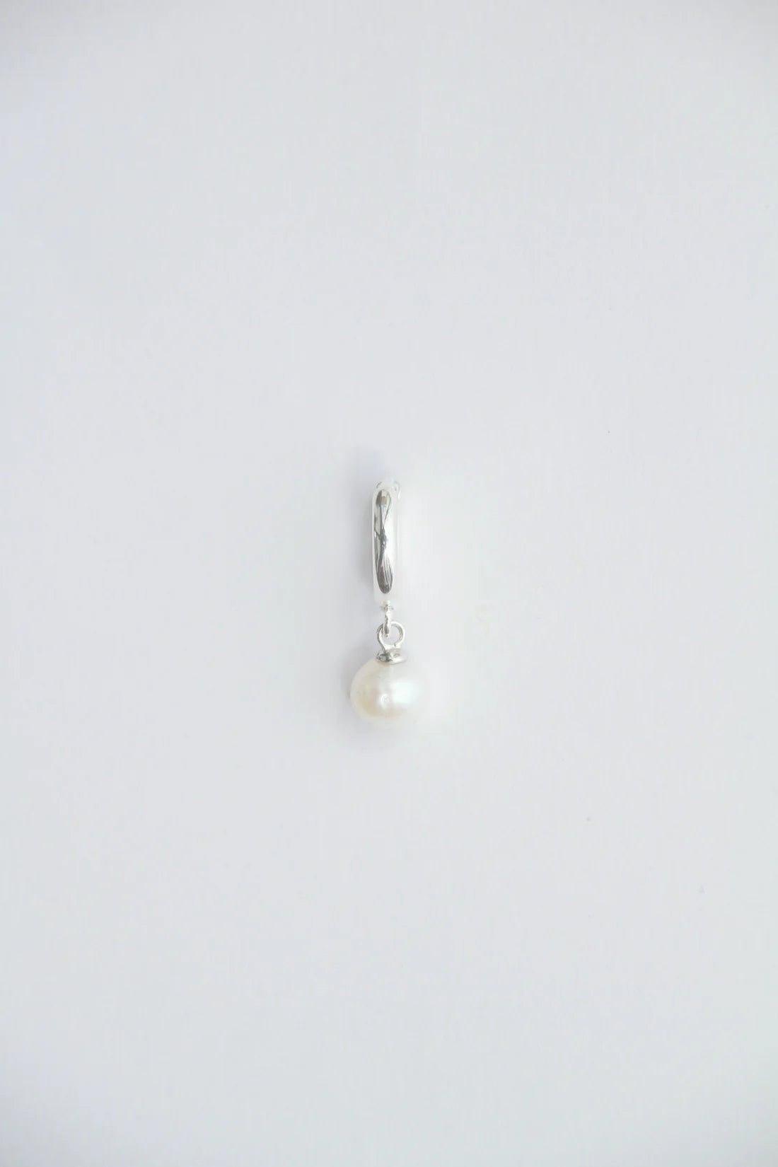 ROUND PEARL HUGGIE EARRING