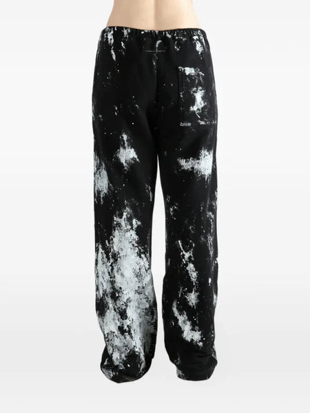 paint-splatter track pants